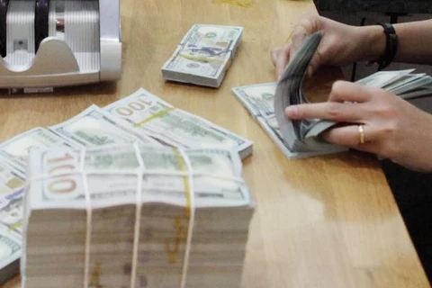 Reference exchange rate up 2 VND on week’s first day