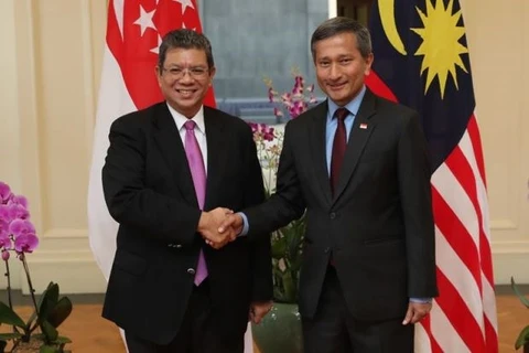 Singapore, Malaysia agree on measures to ease air, sea tensions
