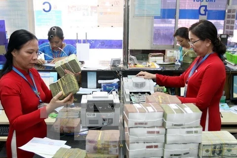 Reference exchange rate up 2 VND at week’s beginning 