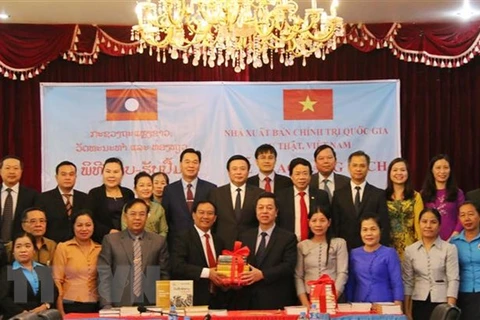 Political theory books presented to Laos 