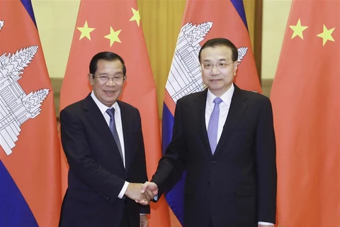 Cambodia, China pledge to further foster cooperation 