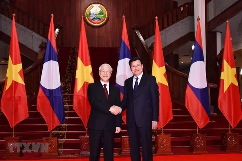 Top Vietnamese leader seeks stronger relations with Laos 