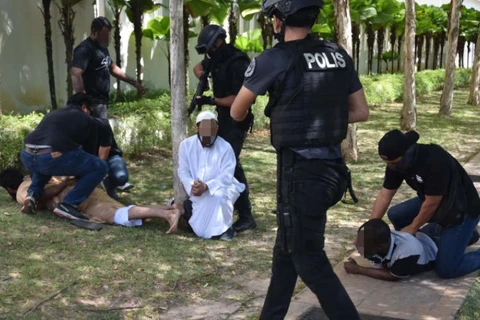 Malaysia arrests nine terror suspects