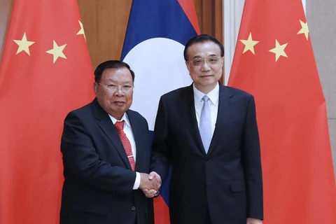 China willing to step up cooperation with Laos