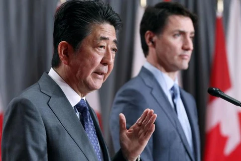 Japanese, Canadian PMs underline benefits of CPTPP