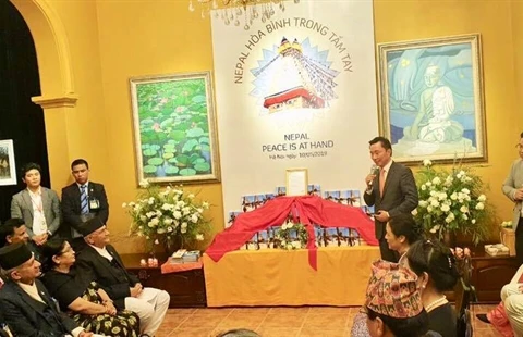 Nepali PM witnesses release of book on peace and Buddhism 