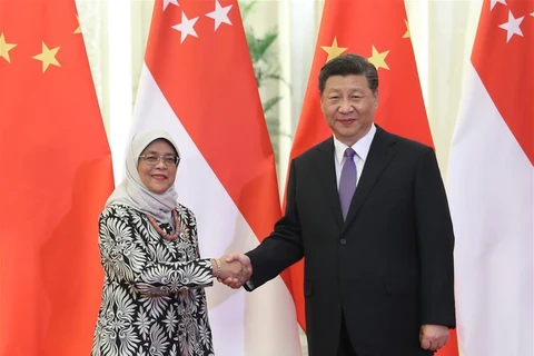 Singapore, China step up bilateral ties