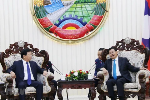 Deputy PM Dung meets Lao Prime Minister, NA Chairwoman
