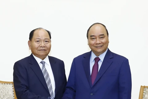 Prime Minister hosts Lao Minister of Home Affairs 