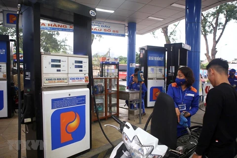 Petrol prices rise over 700 VND per litre 