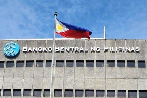 Philippine central bank cuts interest rate as economy slows