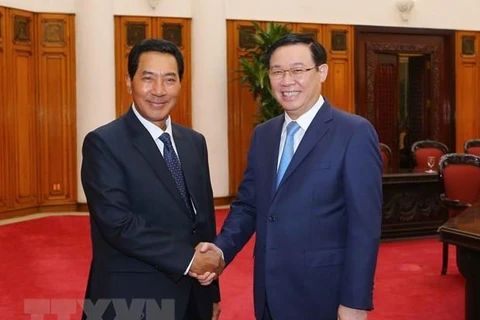 Deputy PM lauds growing ties between Vietnamese, Lao NAs 