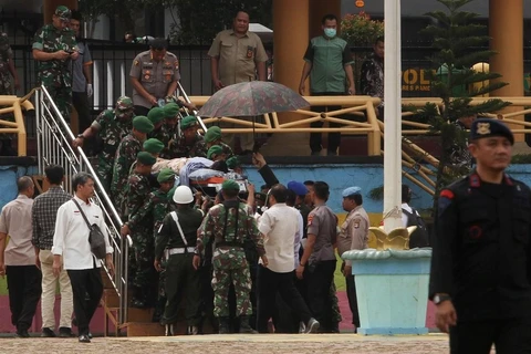 Indonesia arrests 22 terror suspects after minister attacked