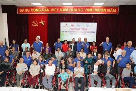 160 wheelchairs presented to Hanoi disabled 