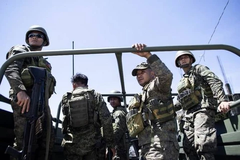 Philippine troops rescue two Indonesians held by Abu Sayyaf
