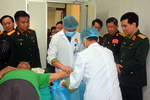 Vietnamese, Lao armies provide health care for 11,660 people
