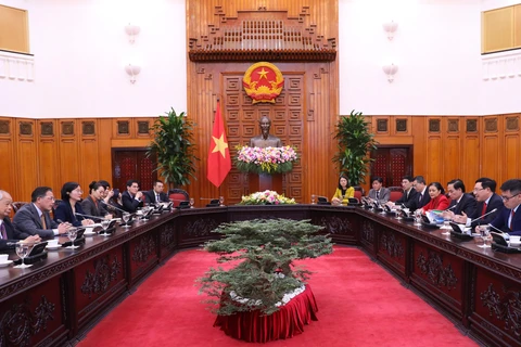 Deputy PM meets delegates to Vietnam-China People’s Forum