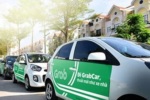 Grab cars must have TAXI light-box or logo