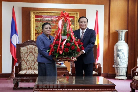 Laos proud at achievements of Communist Party of Vietnam: Lao officials