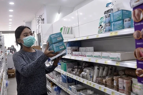 Thailand tightens control of face mask price