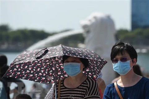 Singapore raises alert for coronavirus outbreak to Orange 