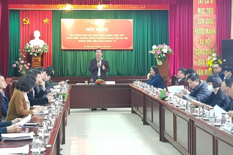 Hanoi vows to accompany firms through COVID-19 crisis