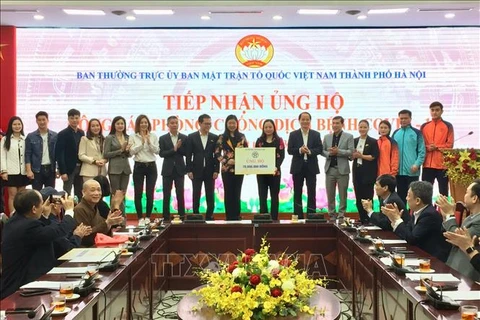 Hanoi donors contribute over 176,000 USD to COVID-19 relief effort