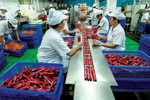 Food processing firms step up production, focus on safety measures for workers