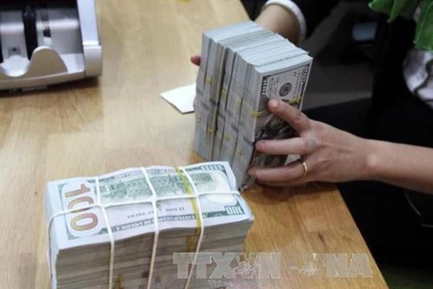 Reference exchange rate down 5 VND at week’s beginning