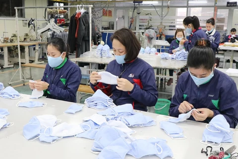 Pandemic-hit garment producers find way to weather crisis