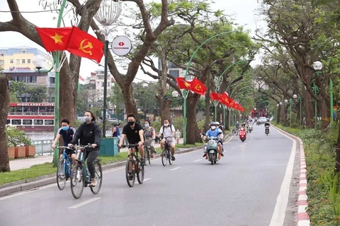 Hanoi relaxing restrictions, not lowering guard against COVID-19: Chairman