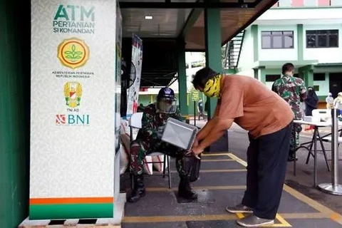 ‘Rice ATMs’ provide staple for struggling Indonesians amid COVID-19