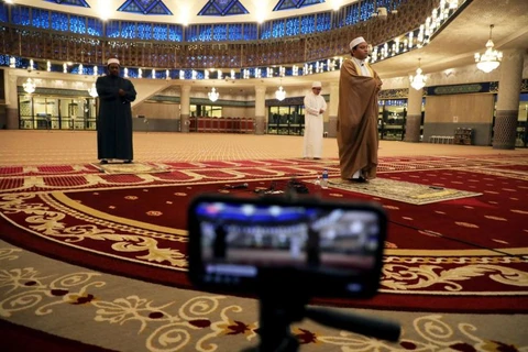 Malaysia allows mass prayers ahead of Eid holiday