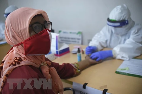 COVID-19 cases rise sharply in Indonesia, Philippines 