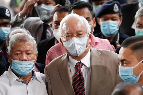Former Malaysian PM Najib sentenced to 12 years in prison