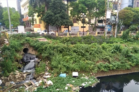 Hanoi's river water remains polluted
