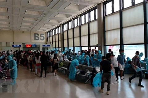 Over 360 Vietnamese citizens flown home from Singapore