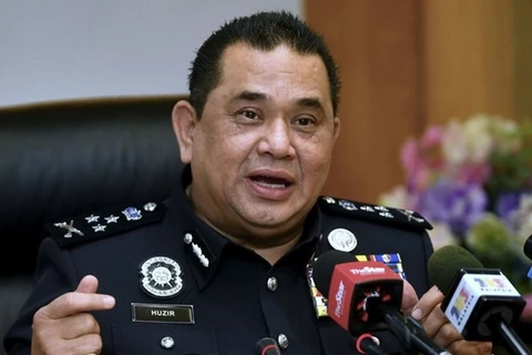 Malaysia detains two network attack suspects