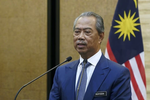 Malaysia PM self-quarantines, Philippines reopens public schools