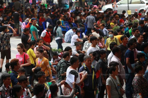 Thailand urges migrant workers to renew work permits