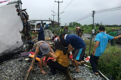 At least 17 killed in bus-train collision in Thailand