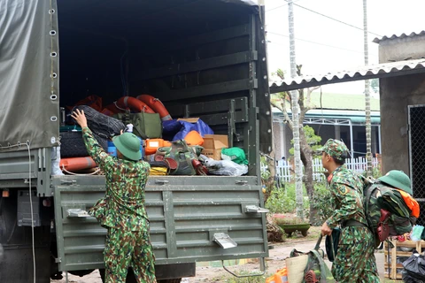 Rescue teams approach isolated power plants by waterway, road routes