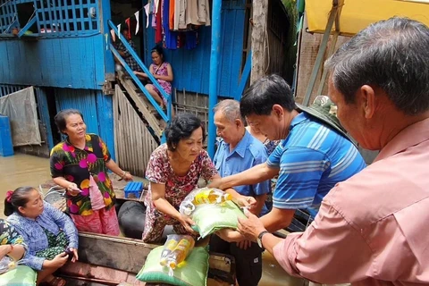 Aid packages presented to flood victims in Cambodia