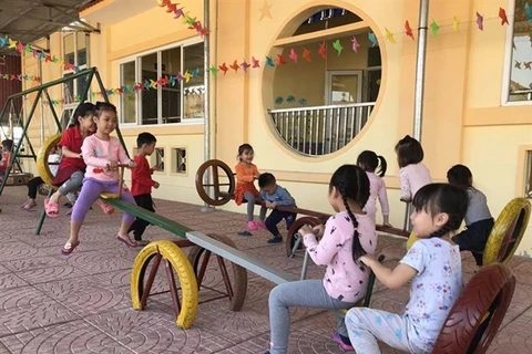 Children enjoy toys made of old tyres in Hai Duong