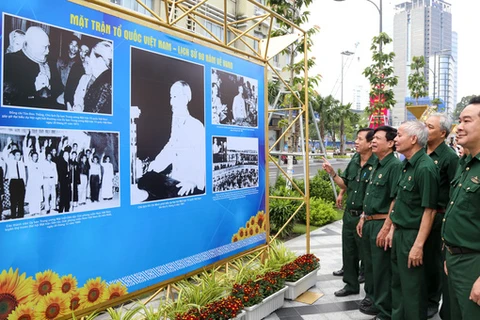 Photo exhibition features Vietnam Fatherland Front’s 90-year operation
