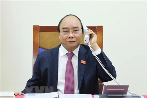 Vietnamese, Lao Prime Ministers hold phone talks 