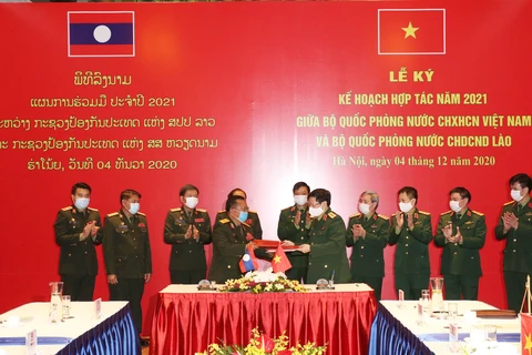 Vietnamese, Lao defence ministries ink cooperation plan for 2021