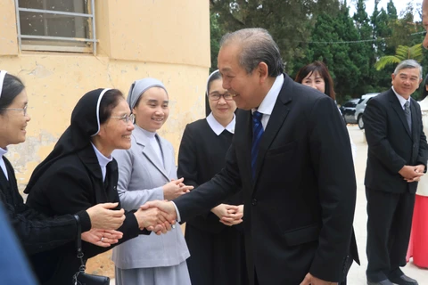 Deputy PM pays Christmas visits to Da Lat Diocese, Evangelical Church
