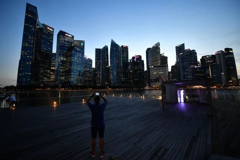 Singapore’s deflation eases in November
