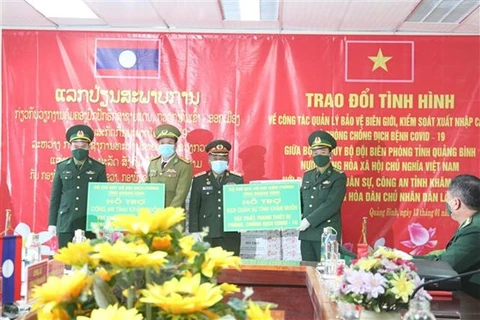Vietnamese, Lao provinces enhance ties in border defence, COVID-19 fight